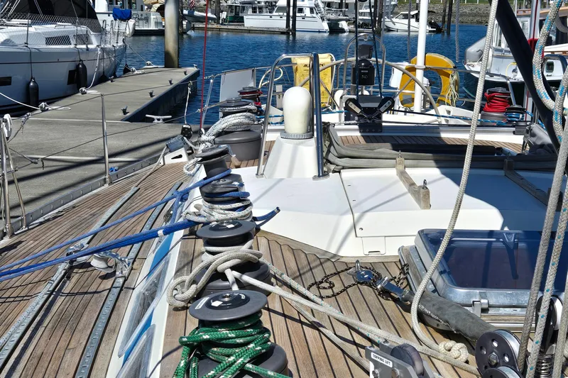 Name Reserved Yacht Photos Pics Deck view of 1985 Swan 46 yacht docked at marina with ropes and winches.
