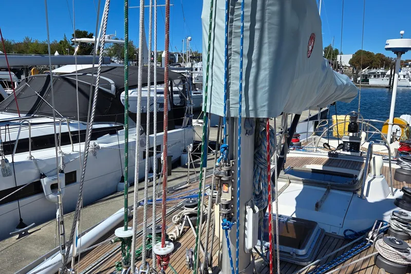 Name Reserved Yacht Photos Pics Swan 46 sailboat from 1985 docked, showcasing rigging and deck details.