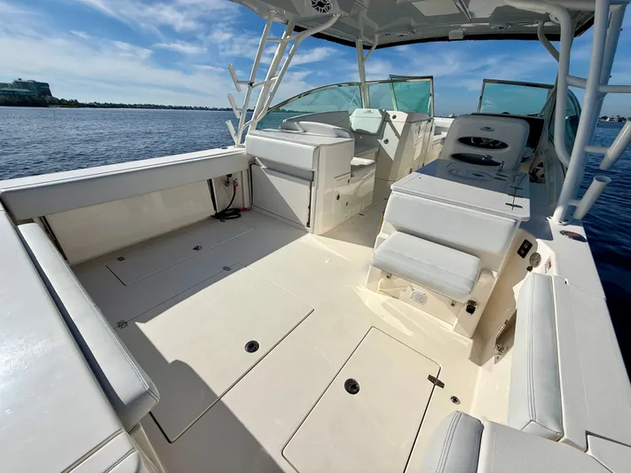  Yacht Photos Pics Cobia 330 Dual Console 2022 on calm waters.