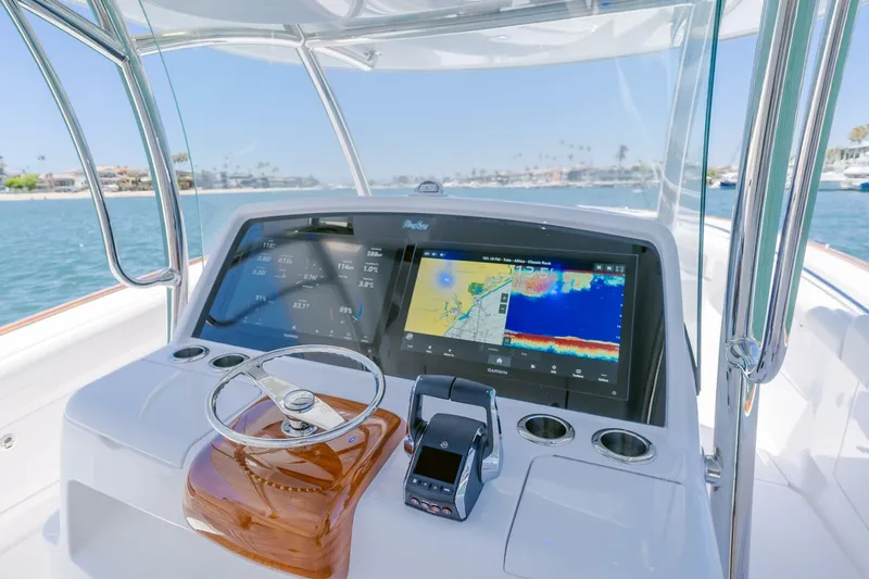  Yacht Photos Pics 2026 Mag Bay 43 Center Console helm with advanced navigation display.