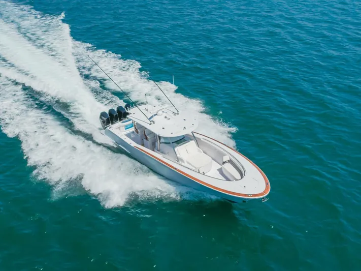  Yacht Photos Pics 2026 Mag Bay 43 Center Console cruising on open water.