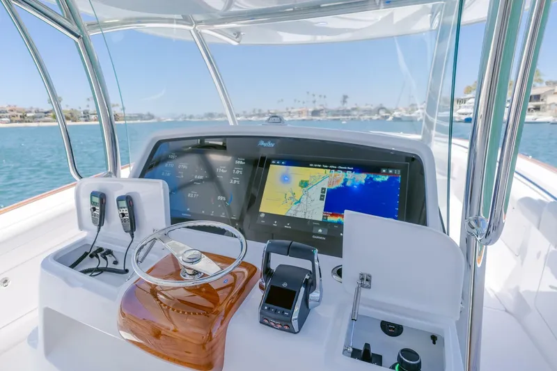  Yacht Photos Pics 2026 Mag Bay 43 Center Console helm with advanced navigation displays and controls.