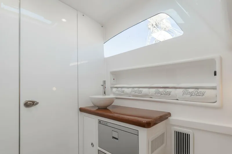  Yacht Photos Pics Interior of 2026 Mag Bay 43 Center Console boat, featuring sleek sink and storage.