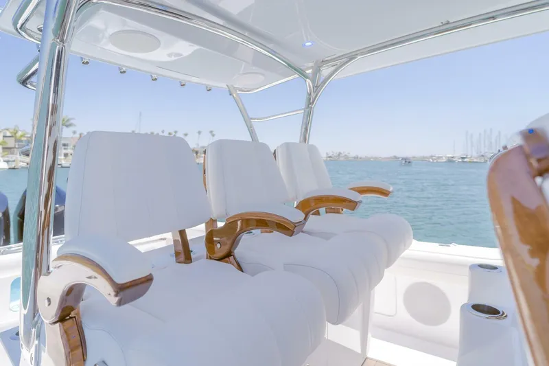  Yacht Photos Pics 2026 Mag Bay 43 Center Console boat with luxurious white seating and ocean view.