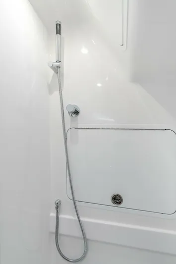  Yacht Photos Pics Shower area in 2026 Mag Bay 43 Center Console boat, featuring sleek modern design.