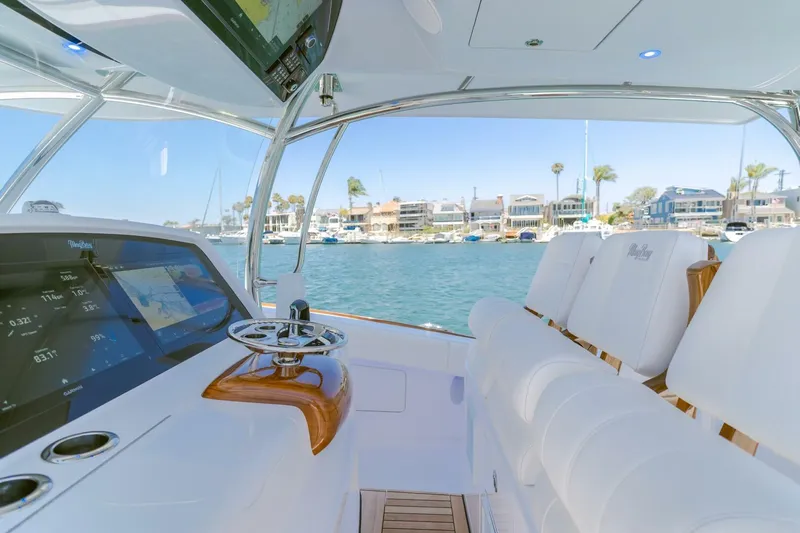  Yacht Photos Pics 2026 Mag Bay 43 Center Console boat interior with advanced navigation system and luxurious seating.