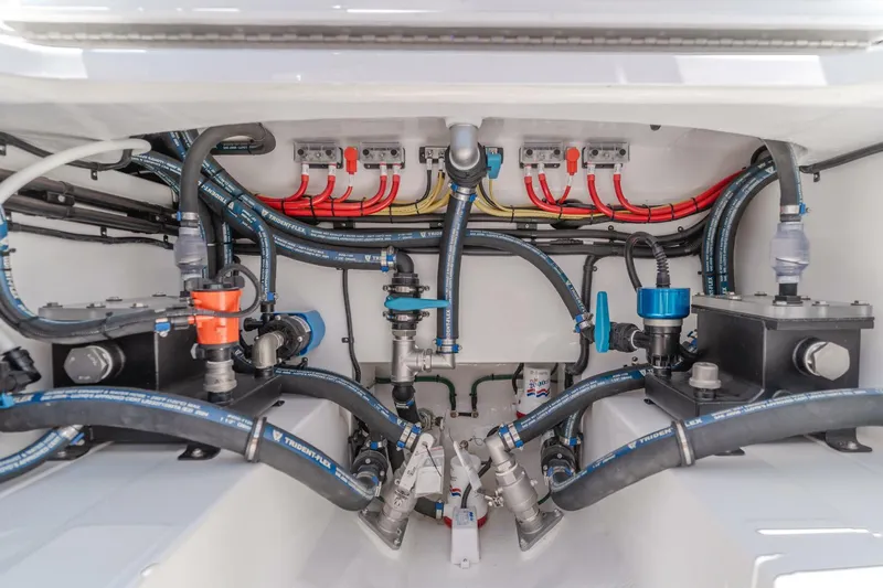  Yacht Photos Pics Engine compartment of 2026 Mag Bay 43 Center Console with hoses and valves.