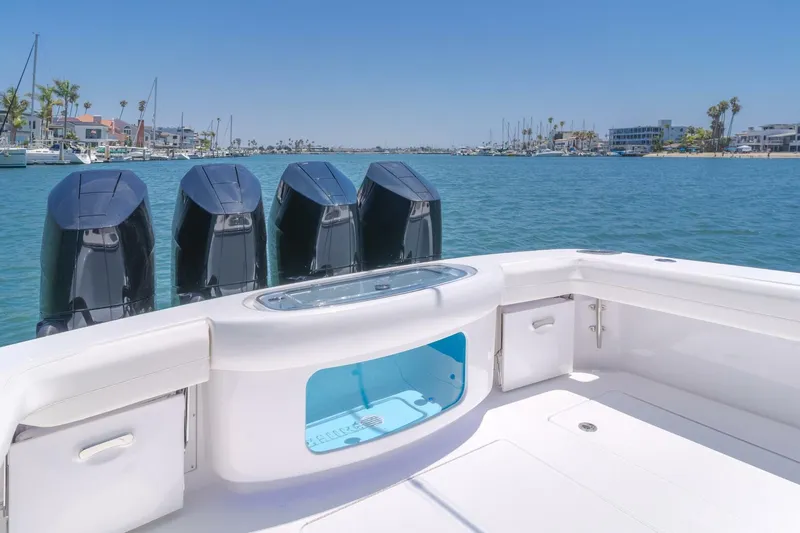  Yacht Photos Pics 2026 Mag Bay 43 Center Console boat with four powerful engines on a sunny day.