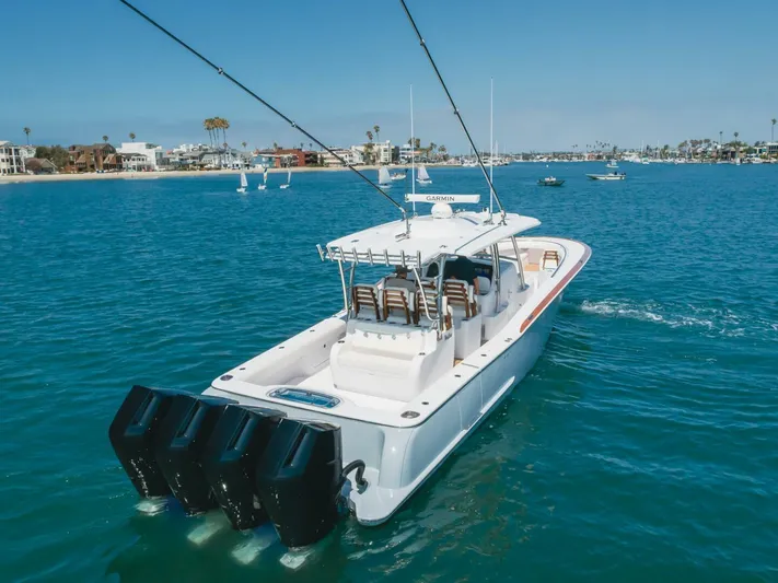  Yacht Photos Pics 2026 Mag Bay 43 Center Console boat cruising on a sunny day.