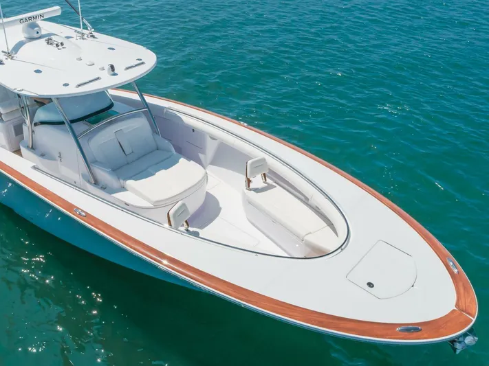  Yacht Photos Pics 2026 Mag Bay 43 Center Console boat on clear blue water.