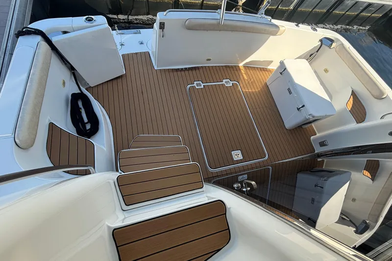 Mr & Mrs Smith Yacht Photos Pics 2003 Carver 450 Voyager Pilothouse boat deck with teak flooring and seating area.