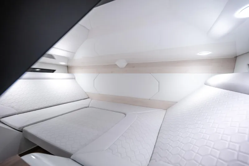 Maxim Yachts | Max43 Comfort Yacht Photos Pics Luxurious interior cabin of 2025 Maxim Yachts 43, featuring elegant white upholstery.