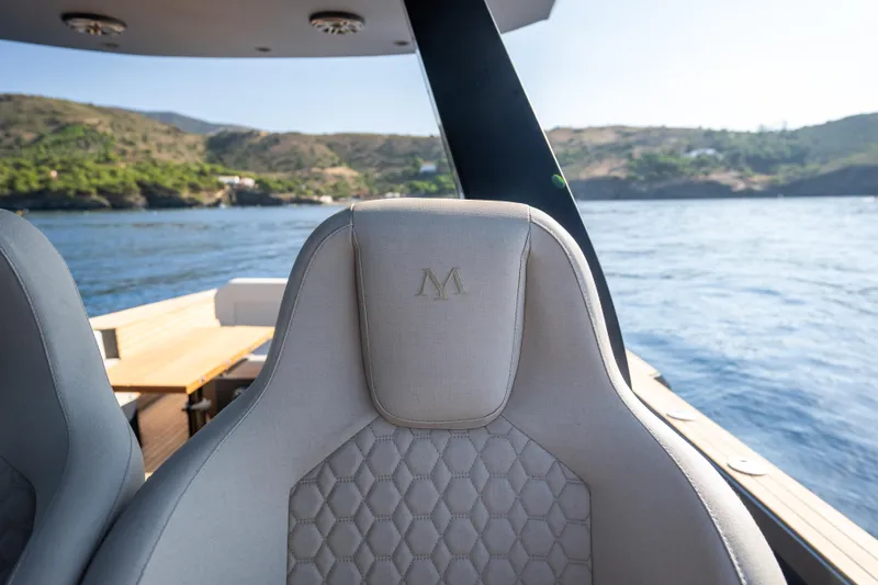 Maxim Yachts | Max43 Comfort Yacht Photos Pics Luxurious seating on a 2025 Maxim Yachts 43, with scenic ocean view.