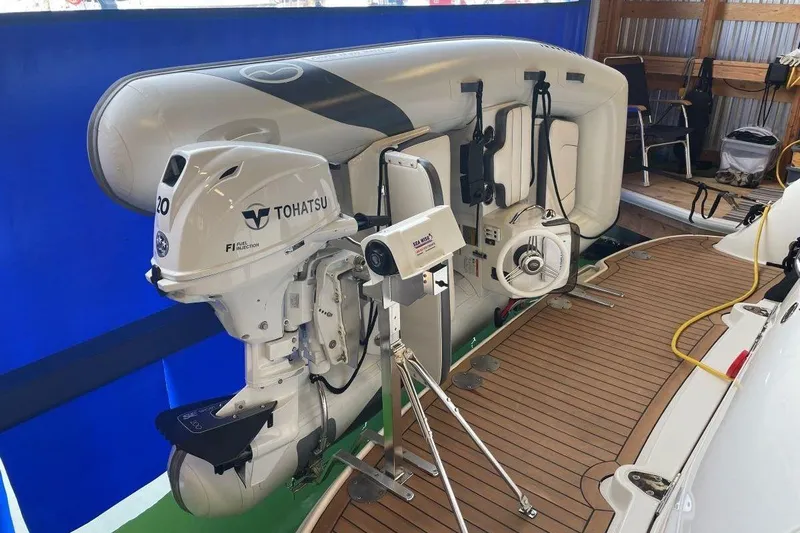  Yacht Photos Pics 2008 Sea Ray 40 Sundancer with Tohatsu outboard motor and inflatable boat on deck.