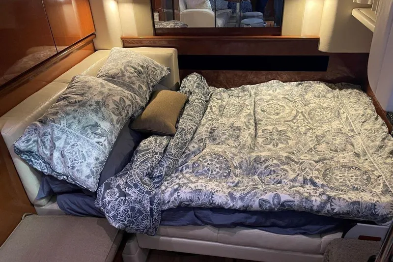  Yacht Photos Pics Luxurious cabin bed in 2008 Sea Ray 40 Sundancer yacht with floral bedding.