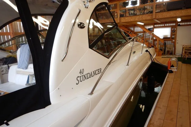  Yacht Photos Pics 2008 Sea Ray 40 Sundancer yacht docked indoors, showcasing sleek design and luxury features.