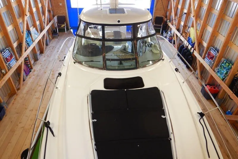  Yacht Photos Pics 2008 Sea Ray 40 Sundancer yacht in a wooden boathouse, top view.