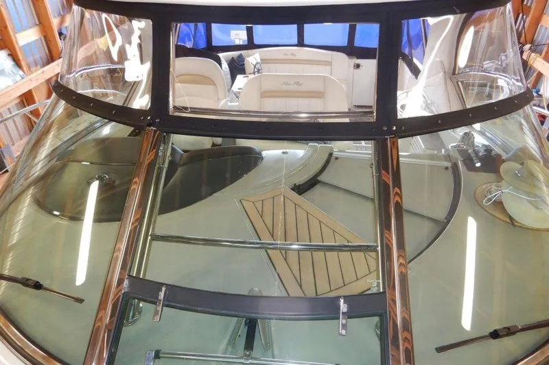  Yacht Photos Pics 2008 Sea Ray 40 Sundancer yacht interior with sleek windshield and luxurious seating.