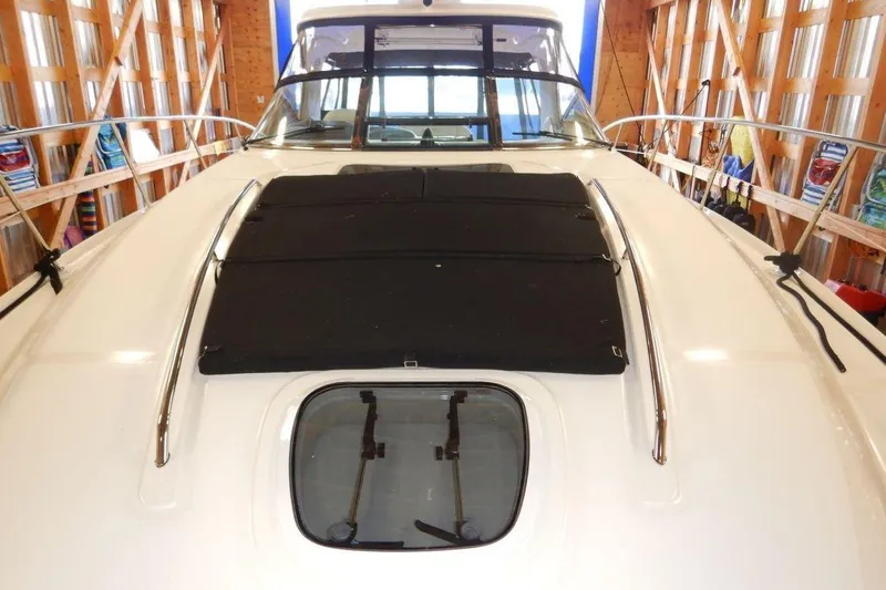  Yacht Photos Pics 2008 Sea Ray 40 Sundancer yacht in storage, featuring sleek design and sunroof.