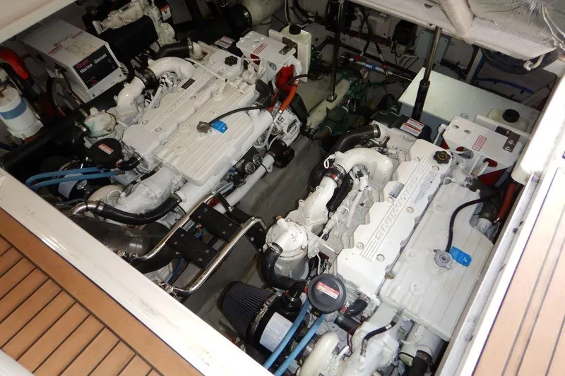  Yacht Photos Pics Engine room of a 2008 Sea Ray 40 Sundancer yacht, showcasing twin engines.