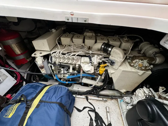 Vixen Yacht Photos Pics Engine compartment of a 2002 Tiara Yachts 3500 Express with visible components and equipment.