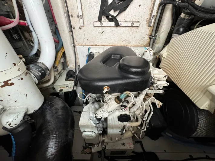 Vixen Yacht Photos Pics Engine compartment of a 2002 Tiara Yachts 3500 Express boat.