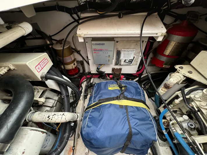 Vixen Yacht Photos Pics Engine compartment of a 2002 Tiara Yachts 3500 Express with equipment and wiring.