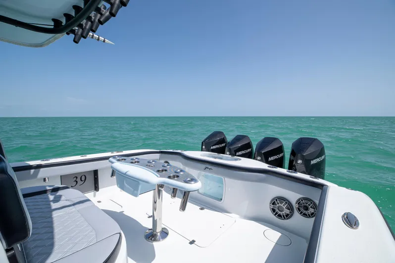  Yacht Photos Pics 2022 Yellowfin 39 boat with multiple engines on open sea.