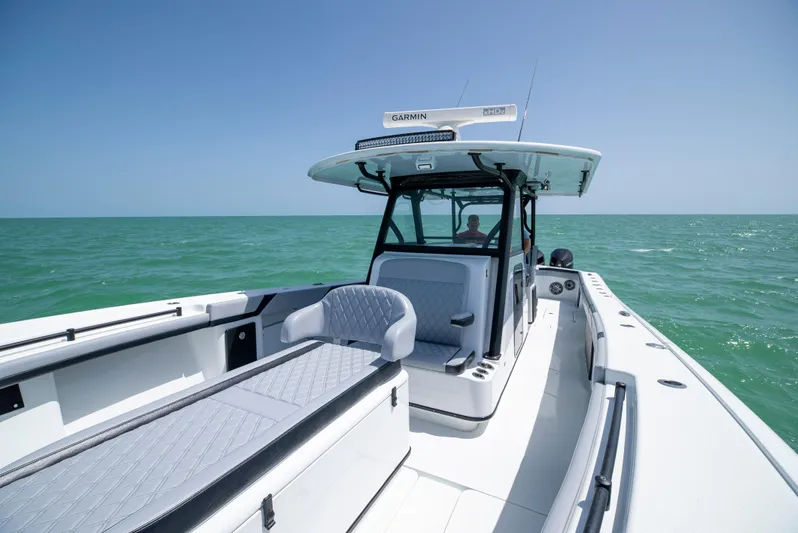  Yacht Photos Pics 2022 Yellowfin 39 boat on open sea, featuring sleek design and modern amenities.