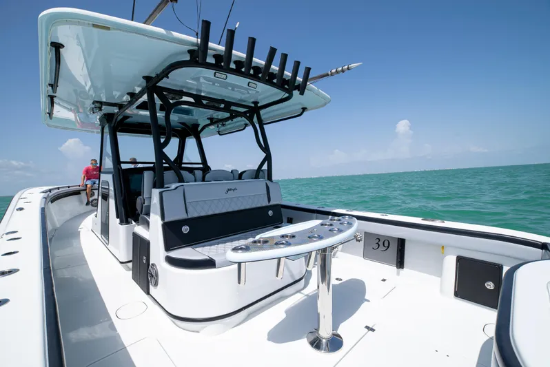  Yacht Photos Pics 2022 Yellowfin 39 boat on open water, featuring sleek design and modern amenities.