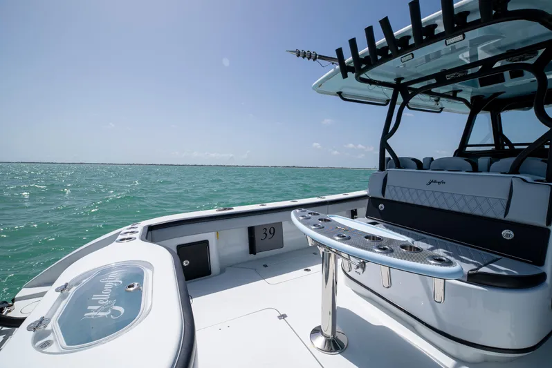  Yacht Photos Pics 2022 Yellowfin 39 boat with sleek design on open water.