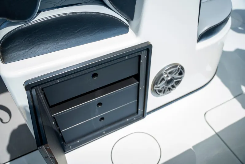  Yacht Photos Pics 2022 Yellowfin 39 boat interior with storage drawers and speaker detail.