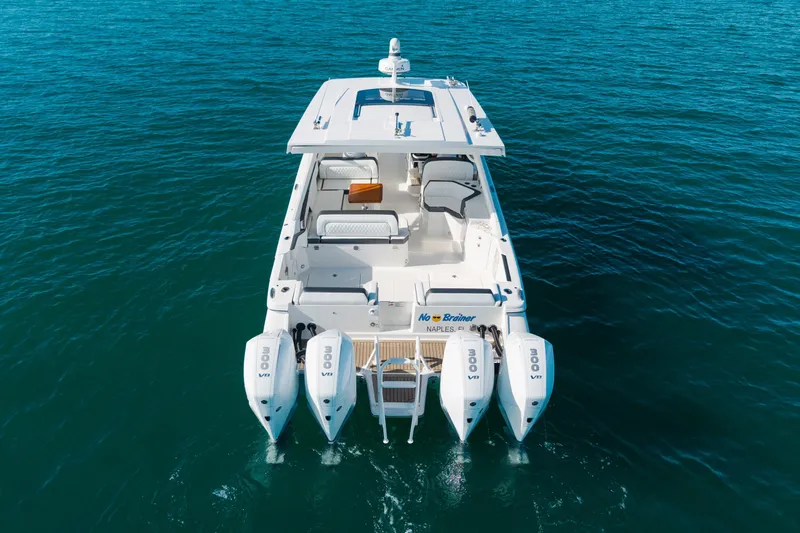  Yacht Photos Pics 2024 World Cat 400 DC-X boat on open water, featuring four powerful engines.