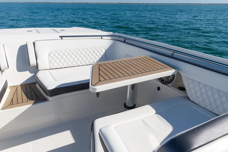  Yacht Photos Pics Luxurious seating area on 2024 World Cat 400 DC-X boat with ocean view.