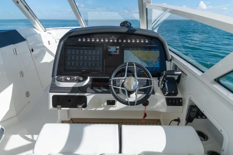  Yacht Photos Pics 2024 World Cat 400 DC-X helm with advanced navigation system and ocean view.