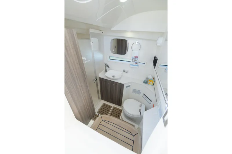  Yacht Photos Pics Luxurious bathroom in 2024 World Cat 400 DC-X boat, featuring modern amenities and sleek design.