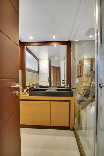  Yacht Photos Pics Luxurious bathroom interior on a 2009 Pershing 72 yacht, featuring modern fixtures and elegant design.