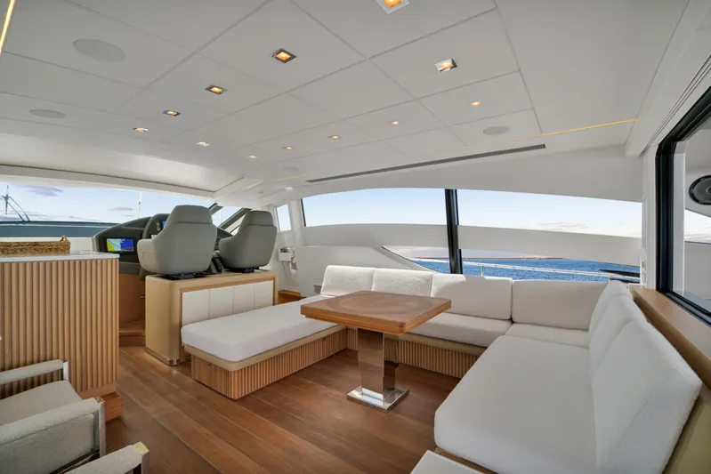  Yacht Photos Pics Luxurious interior of a 2009 Pershing 72 yacht with modern seating and ocean view.