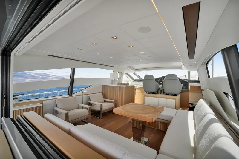  Yacht Photos Pics Luxurious interior of a 2009 Pershing 72 yacht with modern seating and ocean view.