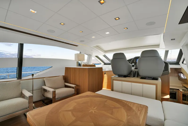  Yacht Photos Pics Luxurious interior of a 2009 Pershing 72 yacht with modern seating and ocean view.