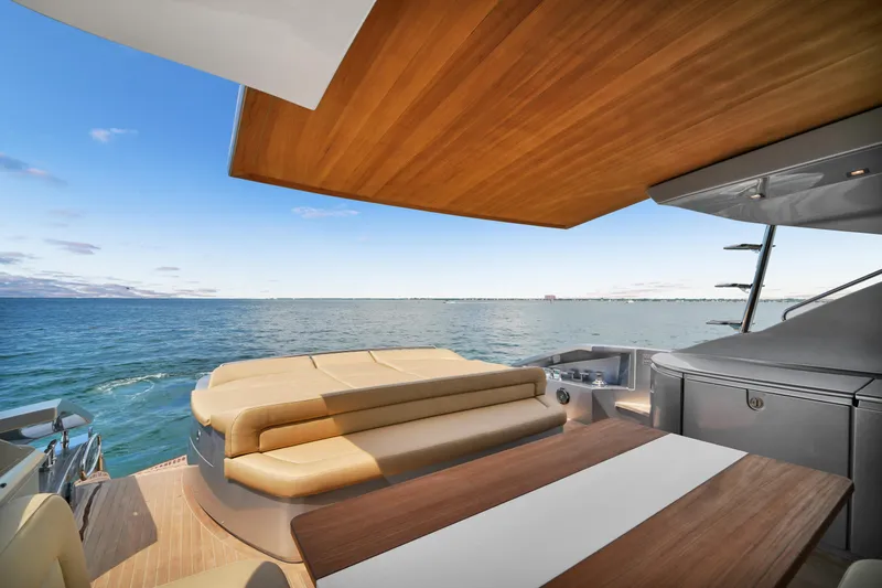  Yacht Photos Pics Luxurious 2009 Pershing 72 yacht deck with ocean view and elegant seating area.