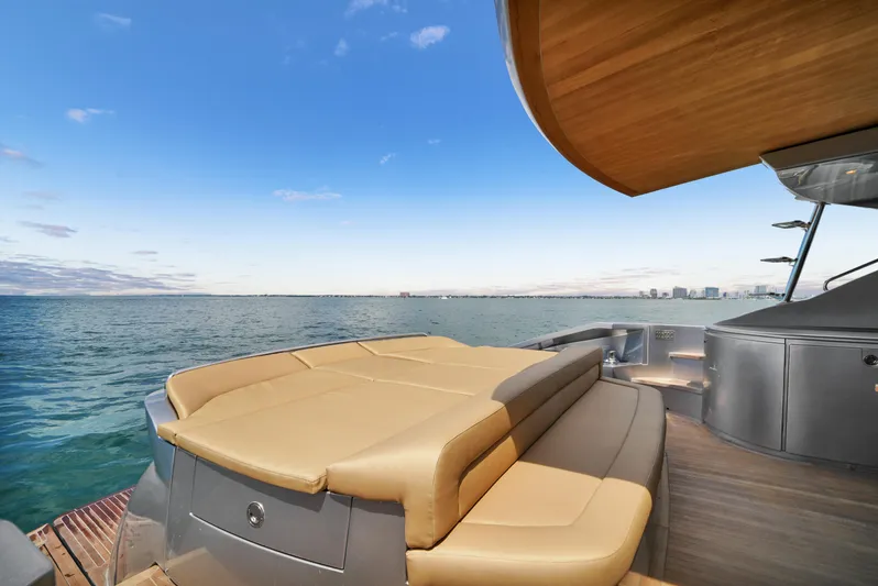  Yacht Photos Pics Luxurious 2009 Pershing 72 yacht deck with ocean view and sleek design.
