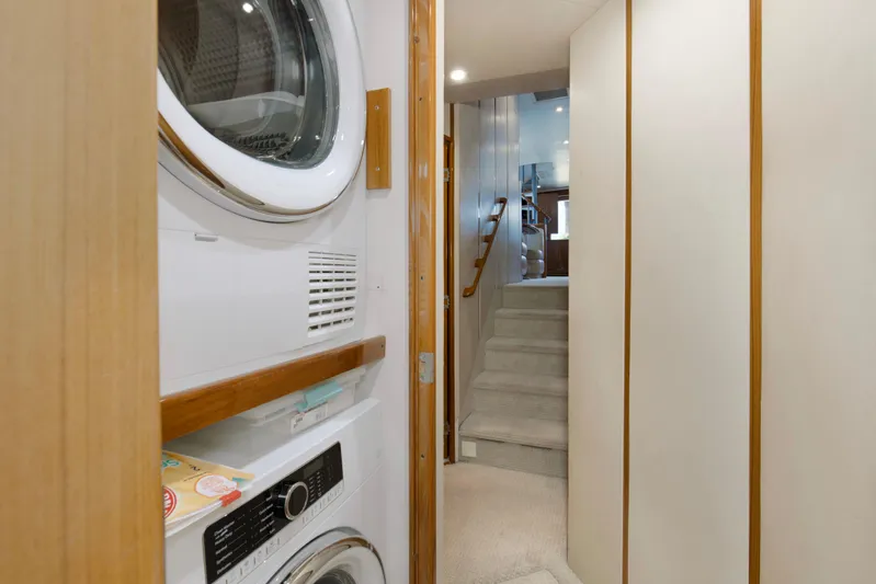 Reel Blues Yacht Photos Pics Laundry area and hallway inside 2007 Viking 64 Enclosed Bridge yacht.