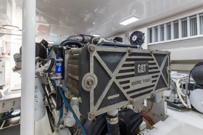 Reel Blues Yacht Photos Pics Engine room of 2007 Viking 64 Enclosed Bridge with CAT Marine Power engine.