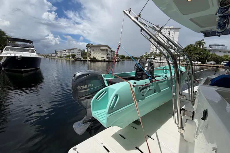 Calacoto Yacht Photos Pics 2023 Royal Cape Catamarans Majestic 530 with Yamaha motor, docked in a scenic marina.