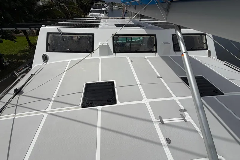 Calacoto Yacht Photos Pics 2023 Royal Cape Catamarans Majestic 530 deck view with hatches and rigging.