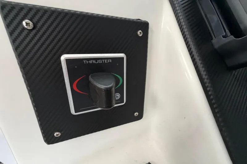 Calacoto Yacht Photos Pics Thruster control panel on 2023 Royal Cape Catamarans Majestic 530, carbon fiber finish.