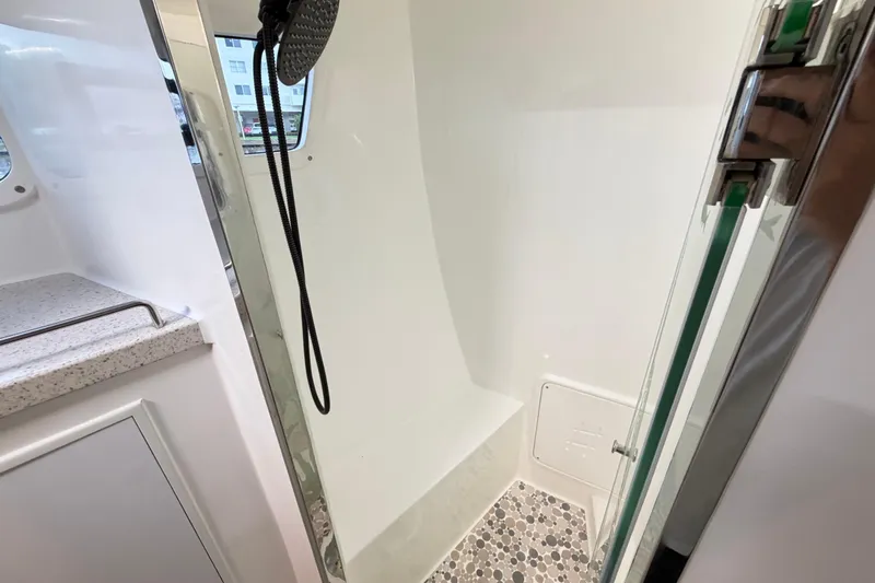 Calacoto Yacht Photos Pics Modern shower area in 2023 Royal Cape Catamarans Majestic 530 yacht.