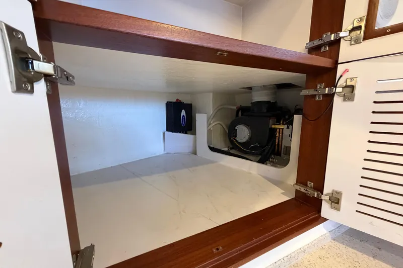 Calacoto Yacht Photos Pics Interior storage compartment of 2023 Royal Cape Catamarans Majestic 530, featuring mechanical equipment.