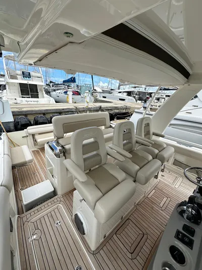  Yacht Photos Pics 2015 Boston Whaler 420 Outrage interior with luxurious seating and sleek design.